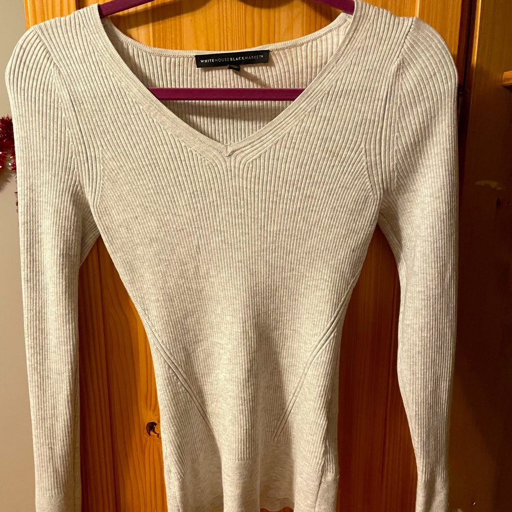 Designer women top by White House Black Market.New. Size S petit.